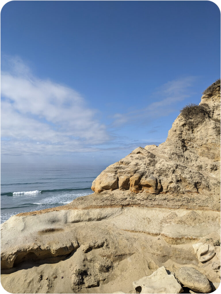 A sandstone bluff juxtaposed with the ocean at Torrey Pines